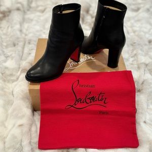 Black ADOX boots by Christian Louboutin in a size 7